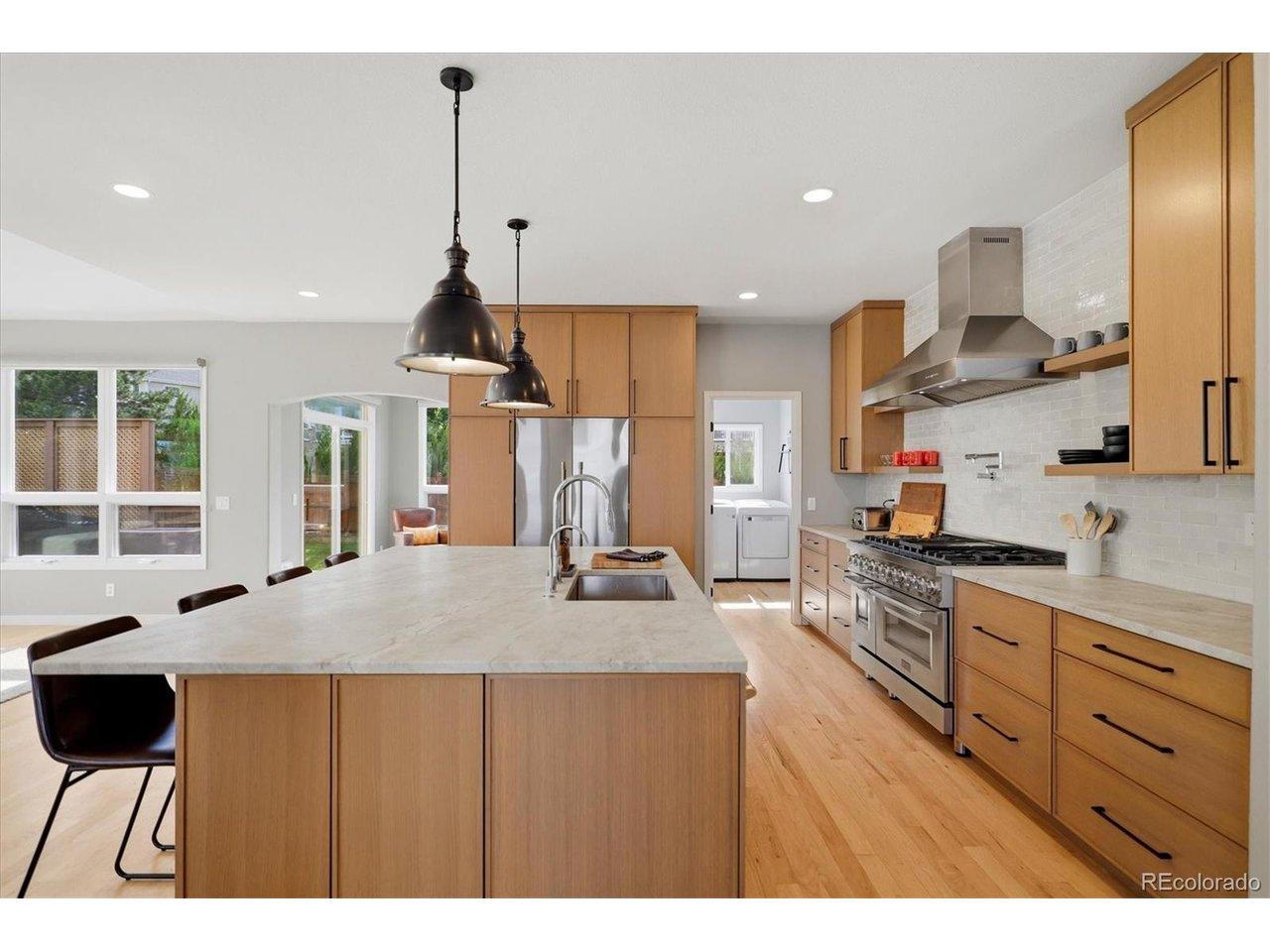 Image 4: Light-filled kitchen with generous prep space and modern finishes. Image 4: Light-filled kitchen with generous prep space and modern finishes.