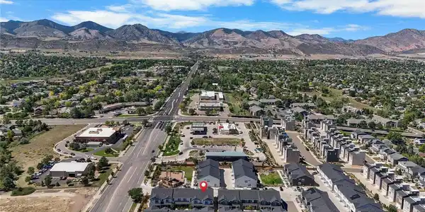 Image 2: Aerial view of 5077 S Robb St in Dakota Ridge, Littleton, CO - sweeping foothills and Front Range mountain views Image 2: Aerial view of 5077 S Robb St in Dakota Ridge, Littleton, CO - sweeping foothills and Front Range mountain views