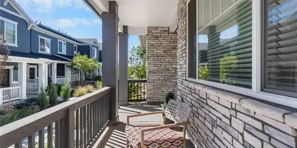Image 4: Full covered front porch offering private outdoor living at this Dakota Ridge, Littleton, CO townhome. Image 4: Full covered front porch offering private outdoor living at this Dakota Ridge, Littleton, CO townhome.