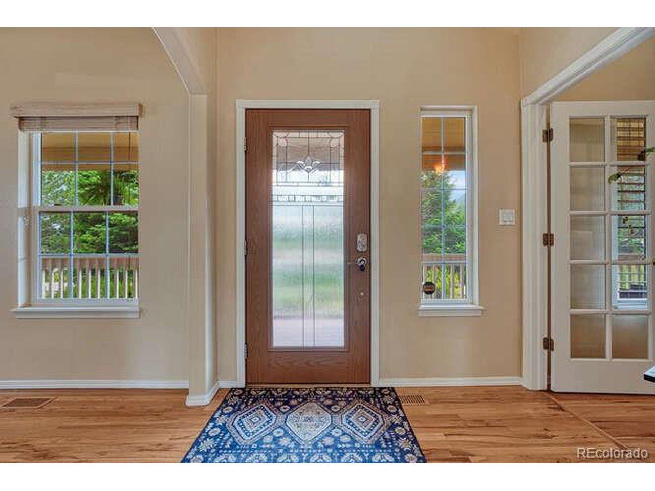 Image 4: Entry with beautiful hardwood floors