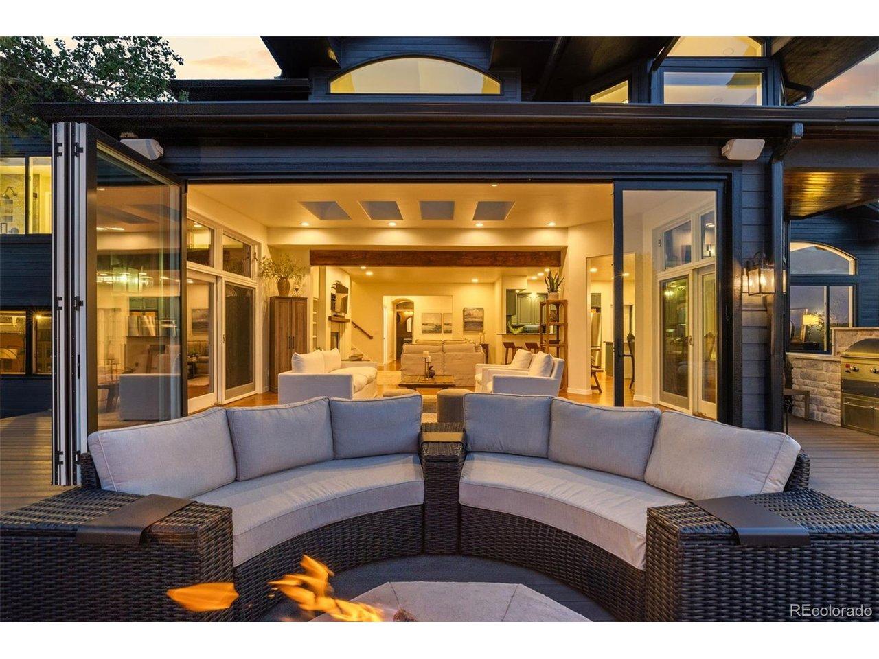Image 2: Anderson 9' folding glass door opens fully to the outdoors for true indoor-outdoor living Image 2: Anderson 9' folding glass door opens fully to the outdoors for true indoor-outdoor living