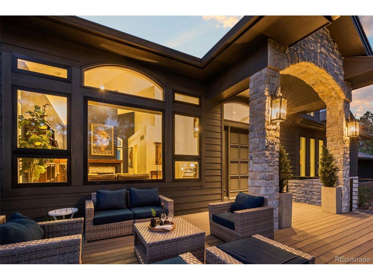 Image 3: Stone-pillared covered porch invites quiet evenings away from it all Image 3: Stone-pillared covered porch invites quiet evenings away from it all