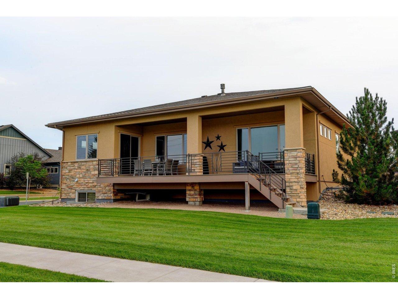 Image 4: Large covered back patio with Mountain views and open fields. Daylight Basement Image 4: Large covered back patio with Mountain views and open fields. Daylight Basement