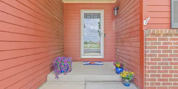Image 4: West facing covered front porch perfect for taking in the sunset and enjoying morning coffee