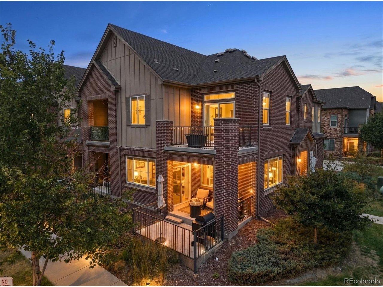 Image 1: This home shines at twilight with warm exterior lighting and timeless curb appeal Image 1: This home shines at twilight with warm exterior lighting and timeless curb appeal