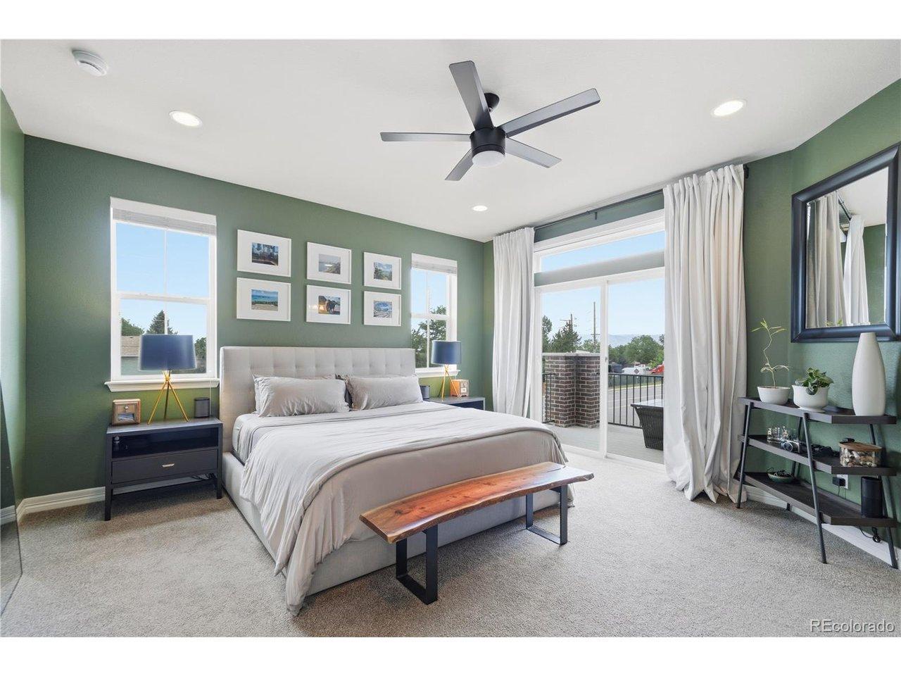 Image 4: Spacious primary suite tucked away from the secondary bedrooms, featuring abundant natural light and private balcony access Image 4: Spacious primary suite tucked away from the secondary bedrooms, featuring abundant natural light and private balcony access