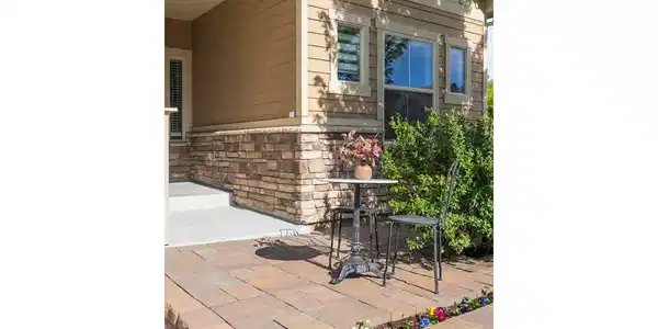 Image 4: Enjoy coffee or sunsets on your extended front patio! Image 4: Enjoy coffee or sunsets on your extended front patio!