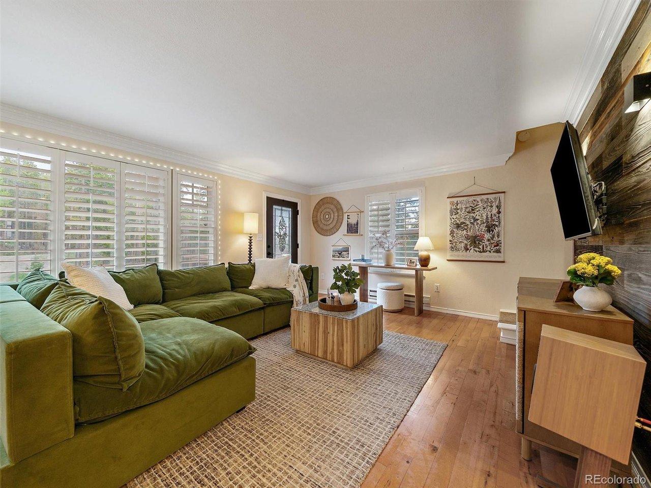 Image 3: Living room | Hardwood floors & plantation shutters Image 3: Living room | Hardwood floors & plantation shutters
