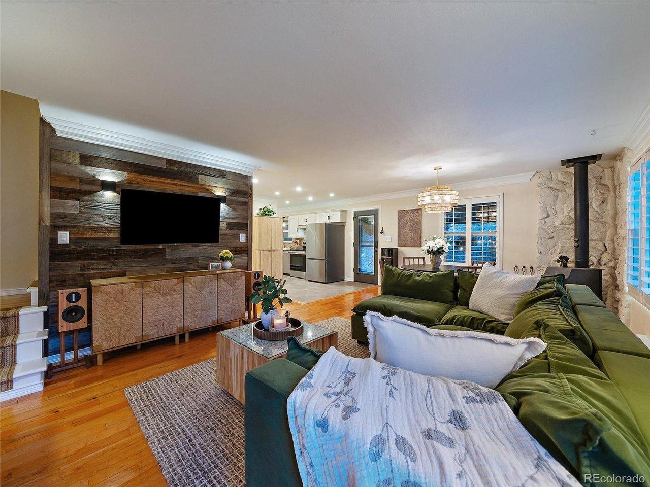Image 4: Bright, open living room flowing into dining room Image 4: Bright, open living room flowing into dining room