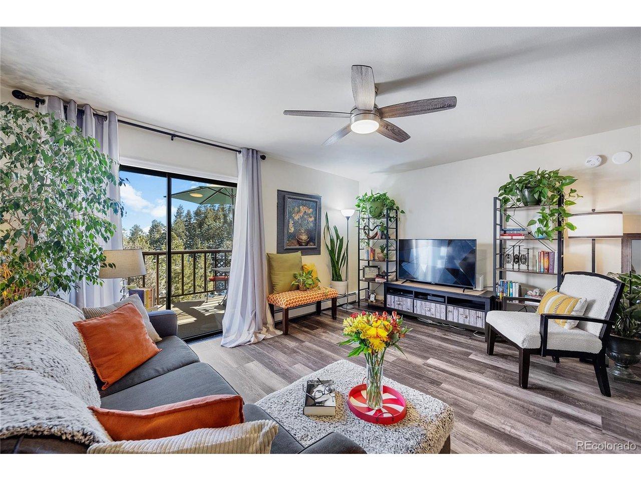Image 2: Bright, cheerful living room with access to the private balcony. Image 2: Bright, cheerful living room with access to the private balcony.