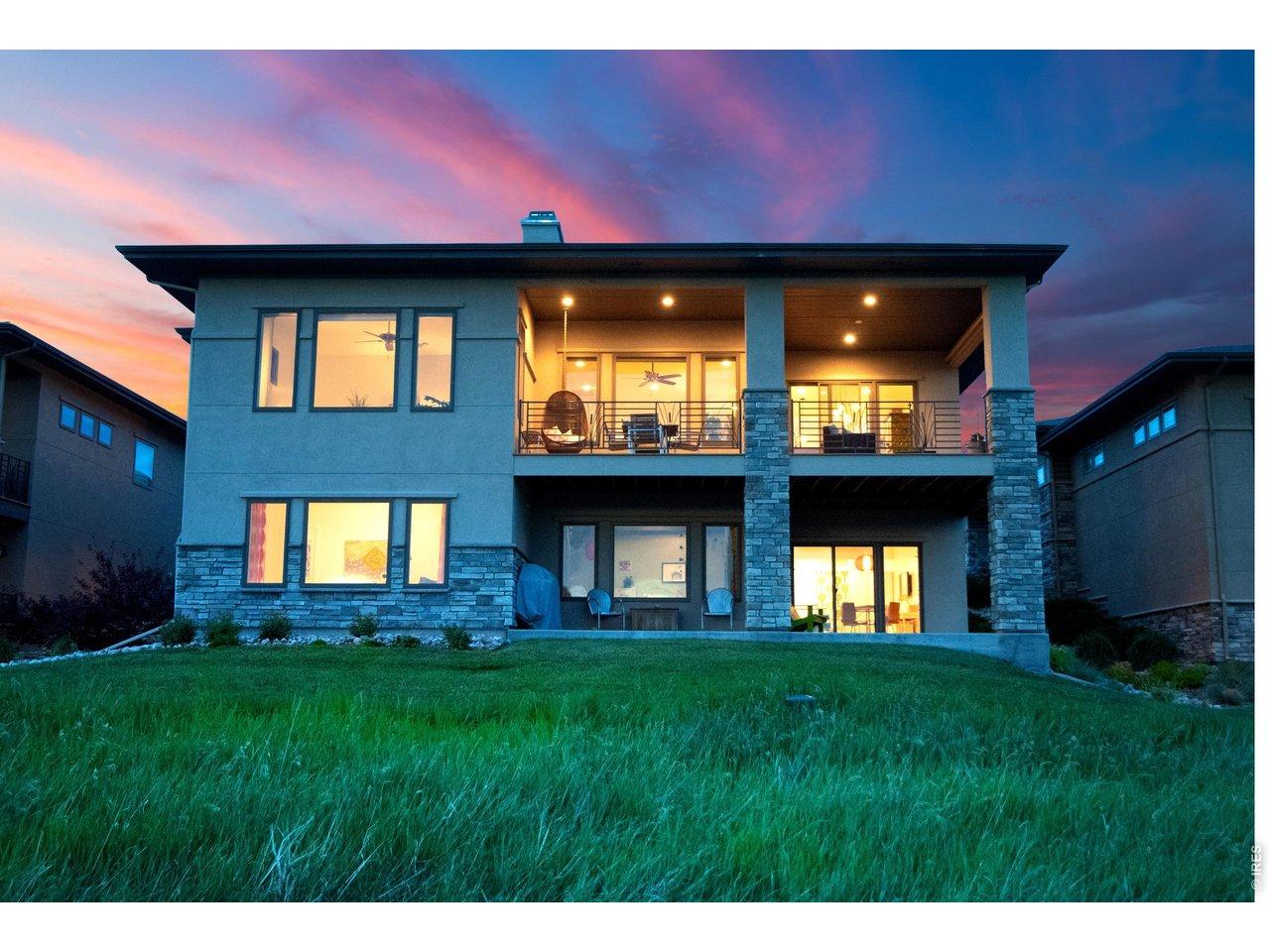 Image 2: Spectacular sunset views from the expansive covered back patio Image 2: Spectacular sunset views from the expansive covered back patio