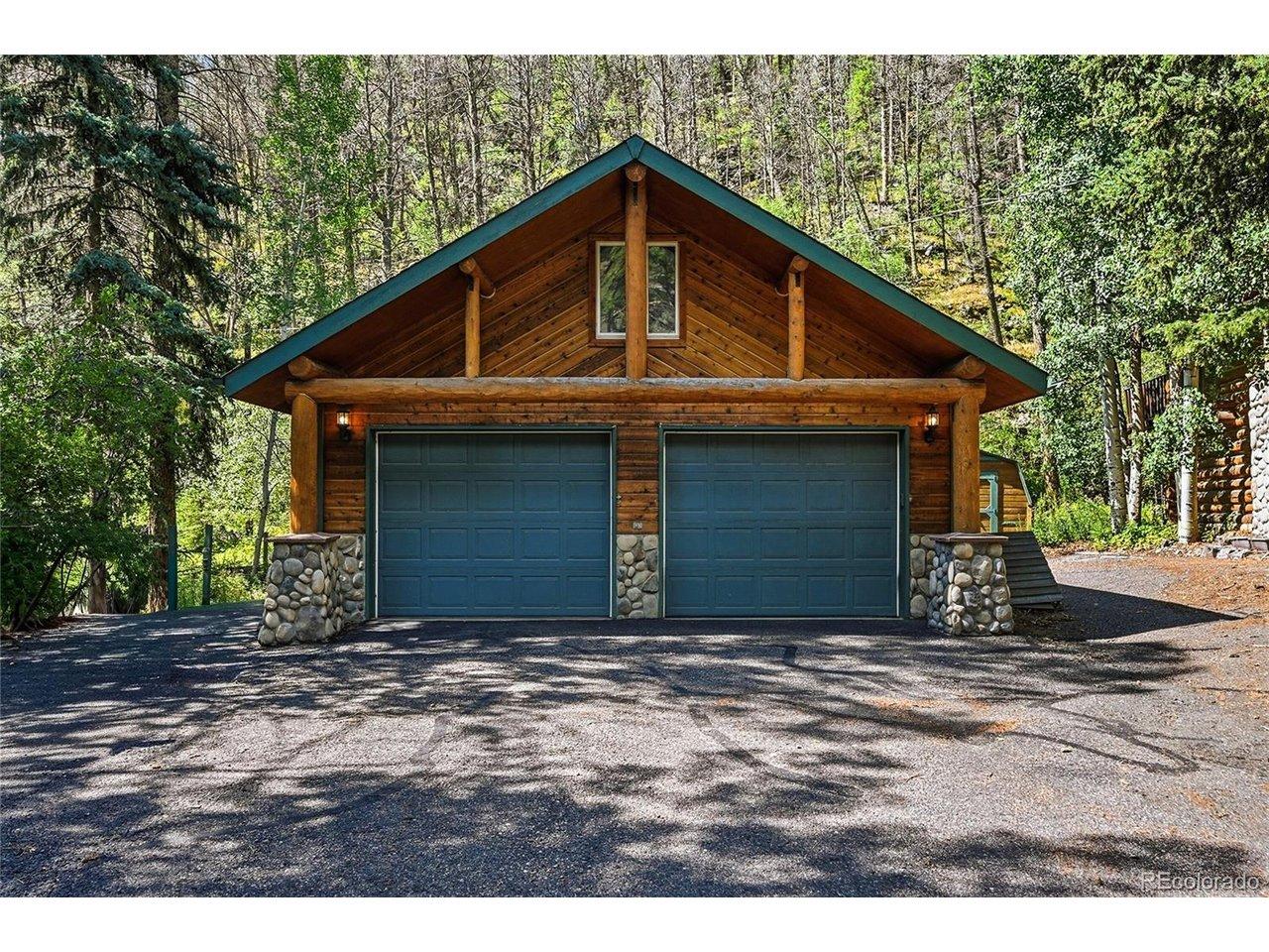 Image 4: 2-car detached garage with upstairs storage
