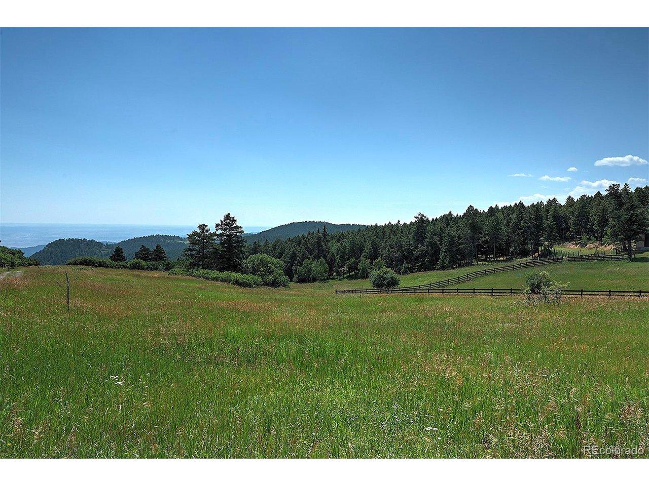 Image 1: Looking east towards the building site and amazing pastures. View has to be seen in person, haze from western slope prevented the best impact Image 1: Looking east towards the building site and amazing pastures. View has to be seen in person, haze from western slope prevented the best impact