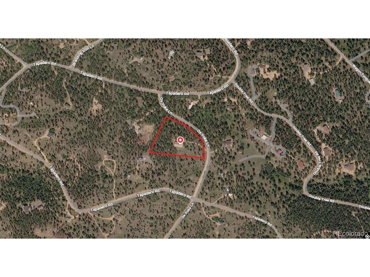 Image 3: Map of home, with lot boundaries marked in red (approximate). The 3.45 acres is fully fire-mitigated, with flat land ready for barn, horses, outbuilding, garage, etc. Home is situated in center of lot, with privacy from neighbors.