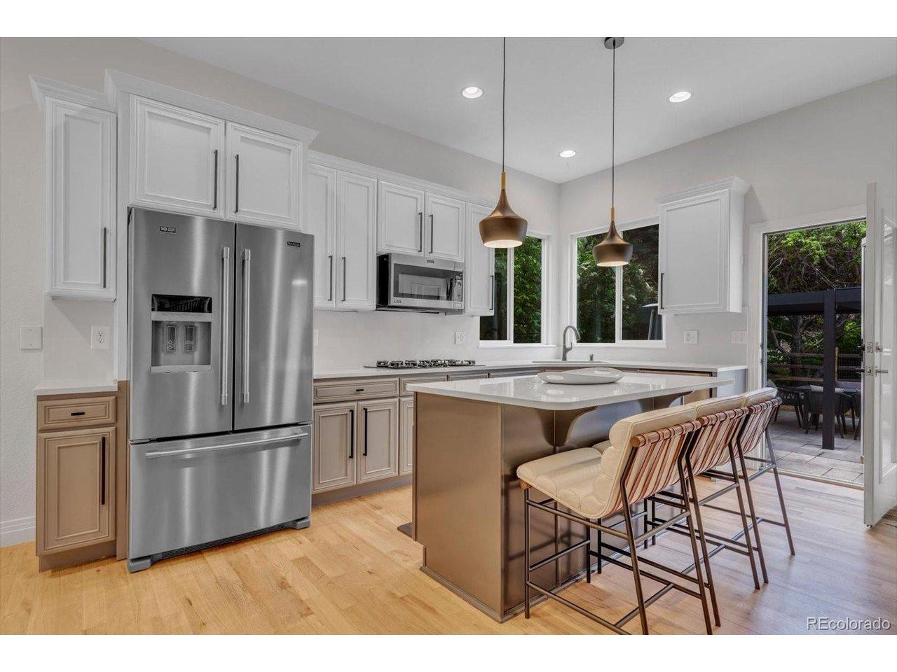Image 1: Beautifully remodeled gourmet kitchen with custom quartz countertops Image 1: Beautifully remodeled gourmet kitchen with custom quartz countertops