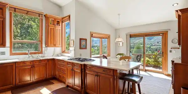 Image 4: Updated beautiful kitchen. Quartzite counters. Cherry cabinets.