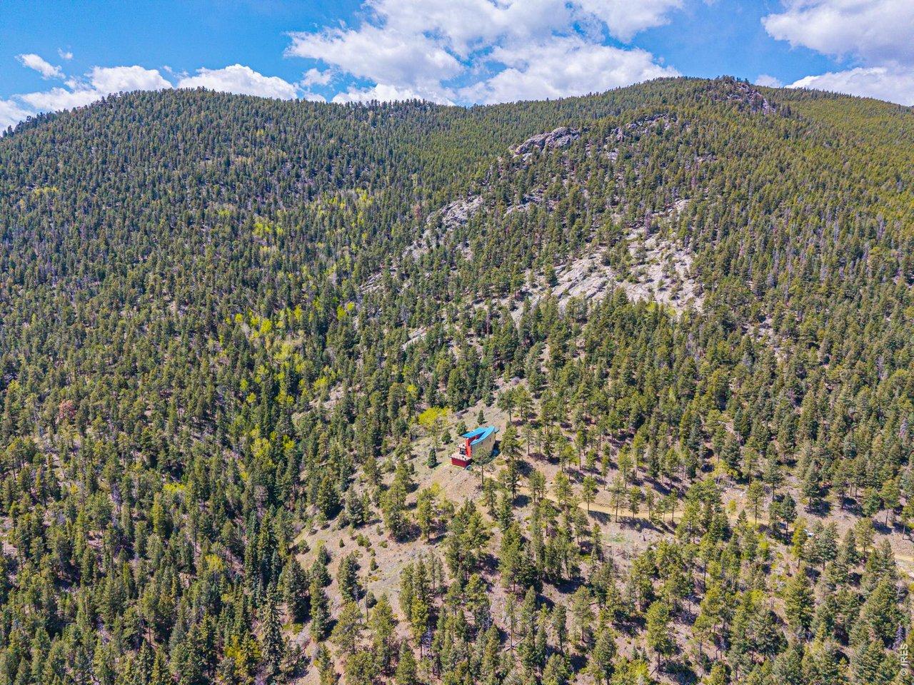 Image 2: Your private, 74 acre modern mountain home is boarded on two sides by Jefferson County Open Space. Image 2: Your private, 74 acre modern mountain home is boarded on two sides by Jefferson County Open Space.