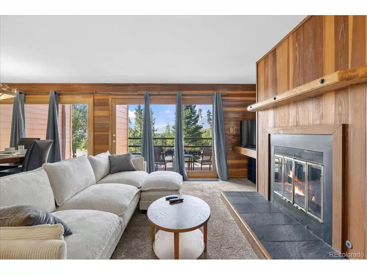 Image 1: Living area featuring gas fireplace Image 1: Living area featuring gas fireplace