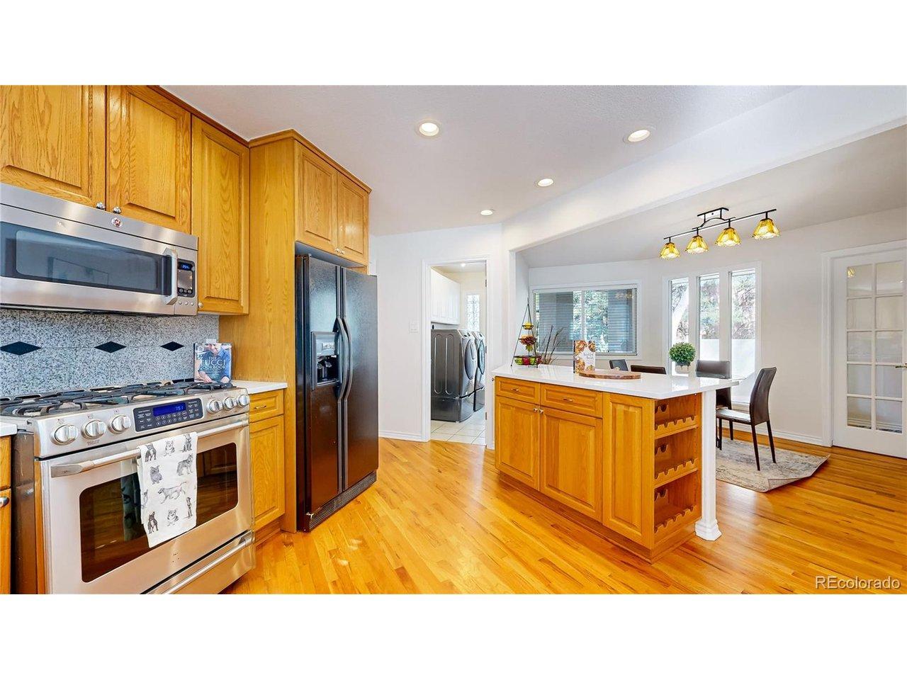 Image 2: The kitchen is open to the dining area and great room, perfect for entertaining. Image 2: The kitchen is open to the dining area and great room, perfect for entertaining.