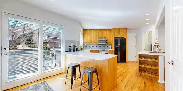 Image 3: There is ample counterspace in the kitchen and the counters are new white quartz. Image 3: There is ample counterspace in the kitchen and the counters are new white quartz.