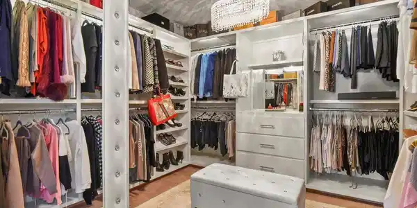 Image 2: Luxurious walk-in closet with built-in cabinetry Image 2: Luxurious walk-in closet with built-in cabinetry