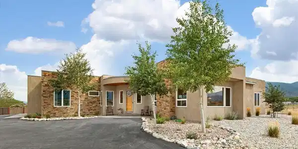 Image 2: Tastefully xeriscaped with yard in back