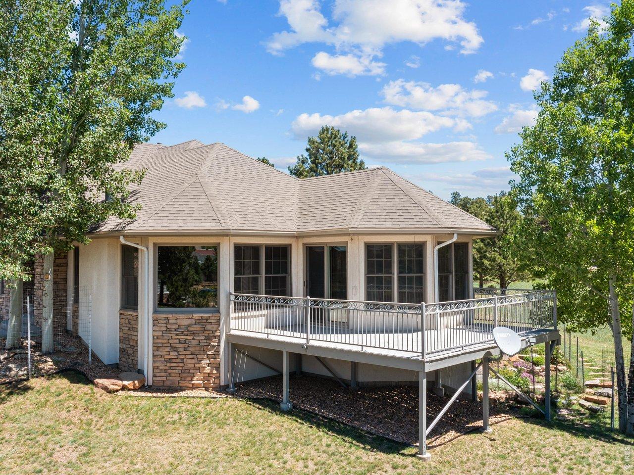 Image 3: Side of Home with Trex Deck