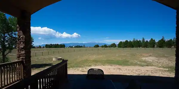 Image 2: Soak in the spectacular Pikes Peak views from your backyard patio or around the fire pit Image 2: Soak in the spectacular Pikes Peak views from your backyard patio or around the fire pit