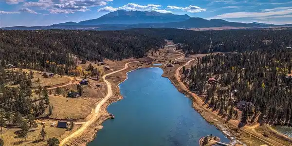 Image 2: Lake and view of Pikes Peak. Image 2: Lake and view of Pikes Peak.