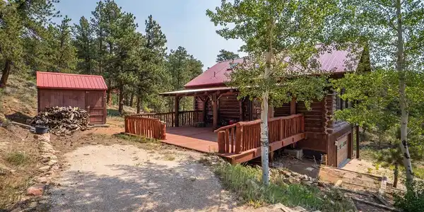 Image 4: Large porch welcomes you with a two-car garage down below. Image 4: Large porch welcomes you with a two-car garage down below.