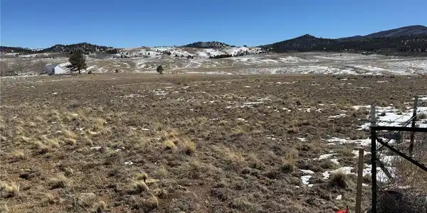 Image 2: View southeast across the lot from the northwest corner