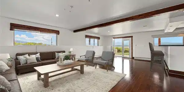 Image 3: Basement family room-Virtually staged