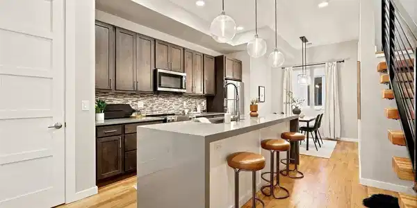 Image 3: quartz countertops & bar seating