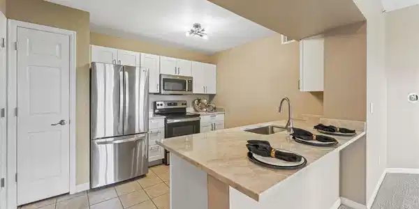 Image 3: Quartzite countertops, brand new cabinetry and fresh paint throughout Image 3: Quartzite countertops, brand new cabinetry and fresh paint throughout