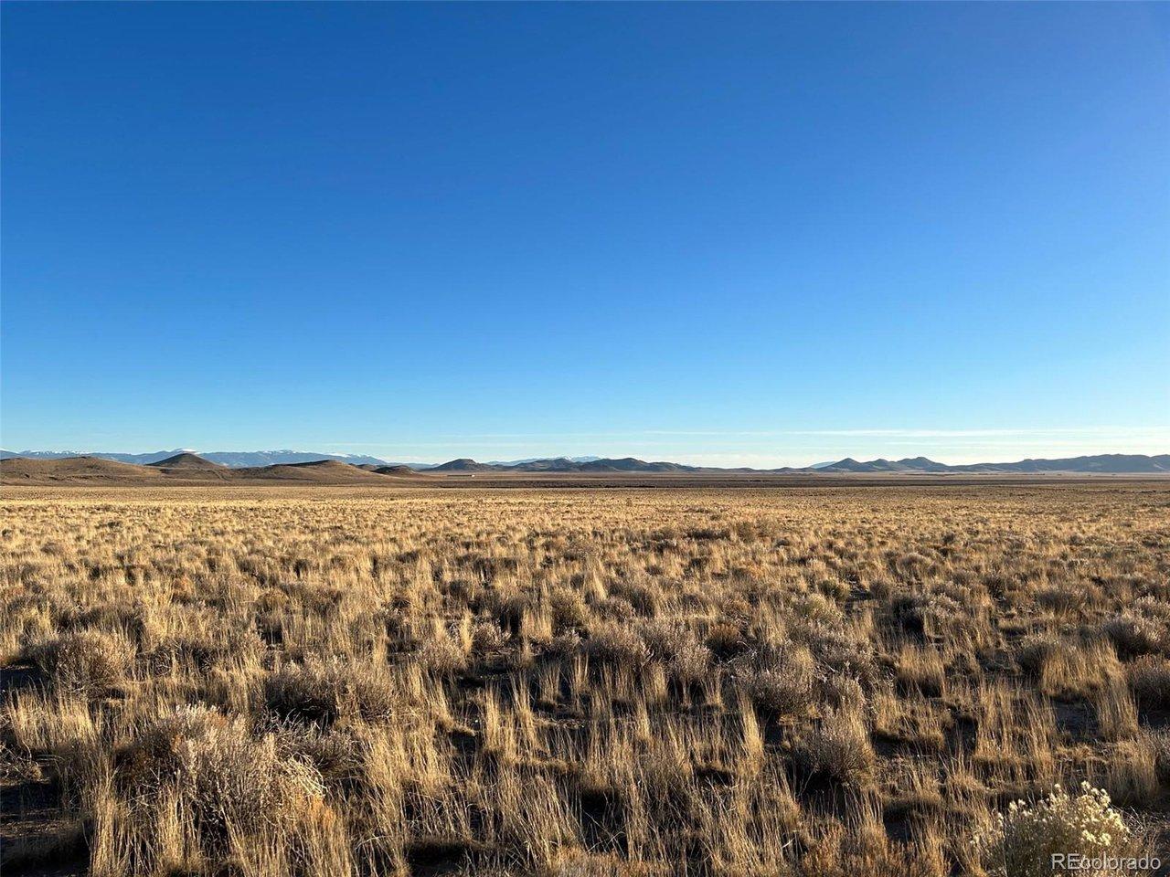 Image 1: Looking south, this property automatically has beautiful mountainous Colorado views. Image 1: Looking south, this property automatically has beautiful mountainous Colorado views.