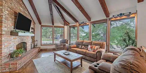 Image 3: The warm, inviting living room with wonderful architectural character, an abundance of natural light and mountain views. Image 3: The warm, inviting living room with wonderful architectural character, an abundance of natural light and mountain views.