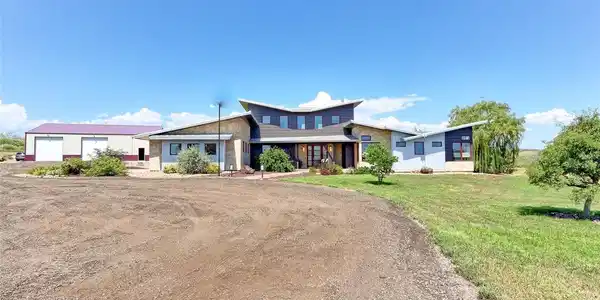 Image 3: This home was designed by award winning designer David Hueter and built by custom home builder Darrel Amelang with features such as hand-built cabinetry, Sierra Pacific wood-clad windows and custom designer upgraded features throughout. Image 3: This home was designed by award winning designer David Hueter and built by custom home builder Darrel Amelang with features such as hand-built cabinetry, Sierra Pacific wood-clad windows and custom designer upgraded features throughout.