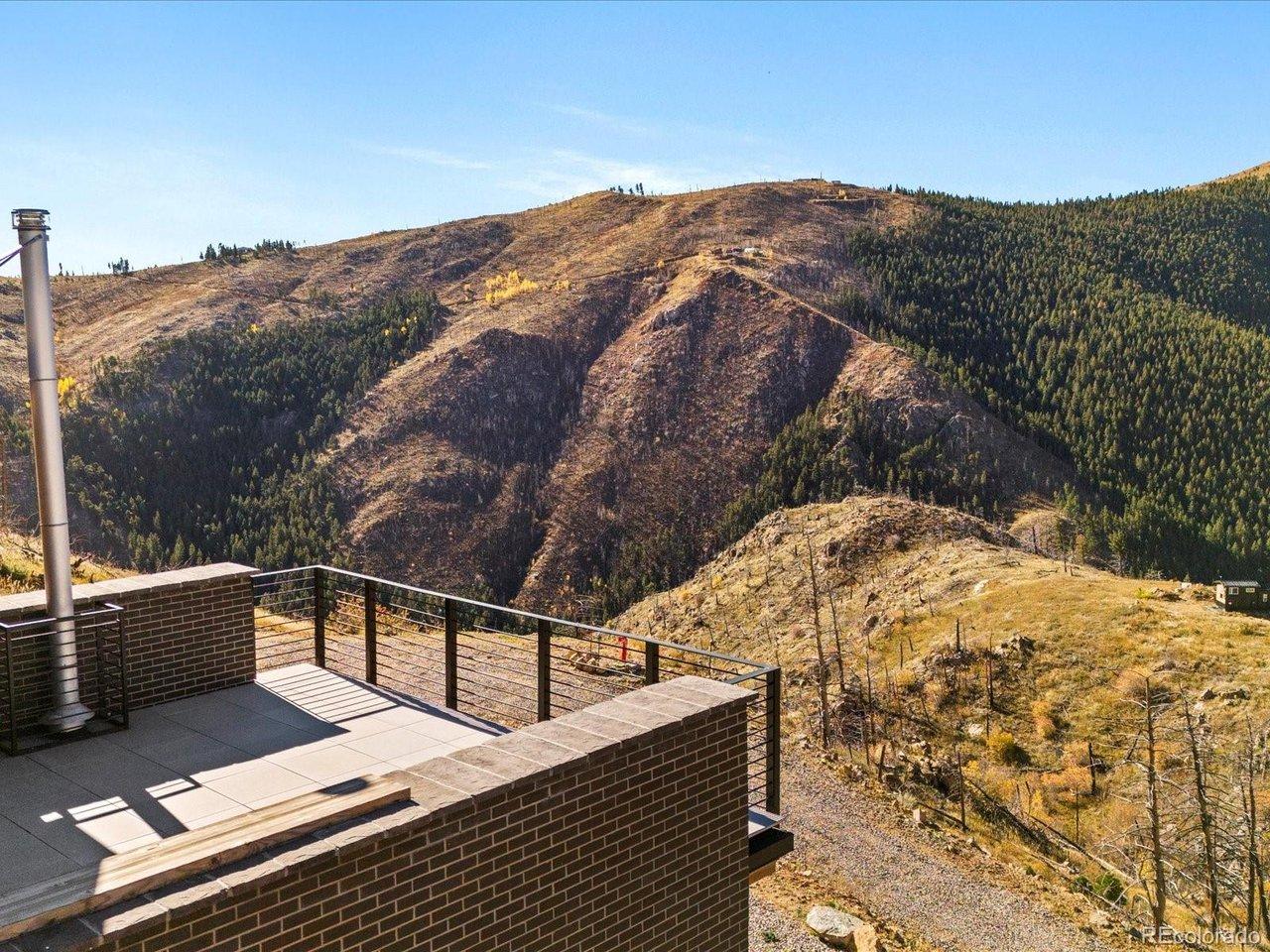 Image 2: rooftop patio with wrought iron railings and panoramic views Image 2: rooftop patio with wrought iron railings and panoramic views