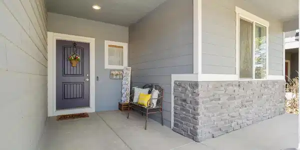 Image 3: Beautiful patio leading you to a lovely front door