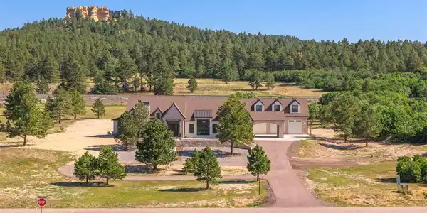 Image 2: Expansive 5 acre lot showcasing this fully custom home's private setting and surrounding natural beauty. Image 2: Expansive 5 acre lot showcasing this fully custom home's private setting and surrounding natural beauty.
