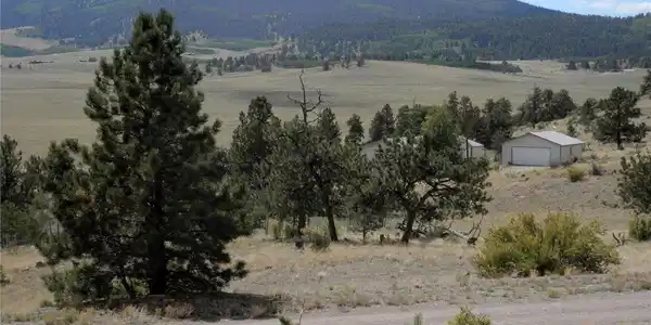 Image 4: Southwest view from the front of the property across the High Rollin' Sipal Ranch to Kaufman Ridge in San Isabel National Forest. Access into the NF is a short drive down the road. Image 4: Southwest view from the front of the property across the High Rollin' Sipal Ranch to Kaufman Ridge in San Isabel National Forest. Access into the NF is a short drive down the road.