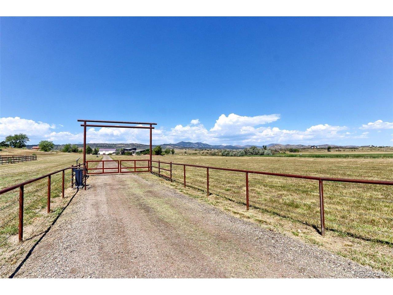 Image 4: There is a solar powered Entry gate that opens with code, or remote" that automatically opens and closes on departure. The gate is set back off main road 70 feet to allow gooseneck horse trailers to pull completely off the road before entering the property Image 4: There is a solar powered Entry gate that opens with code, or remote" that automatically opens and closes on departure. The gate is set back off main road 70 feet to allow gooseneck horse trailers to pull completely off the road before entering the property