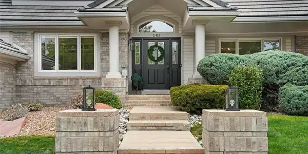 Image 2: Welcome to 11413 W Asbury Ct! Situated on one the neighborhood's premier streets far from the noise of S Kipling Blvd or W Jewell Ave!