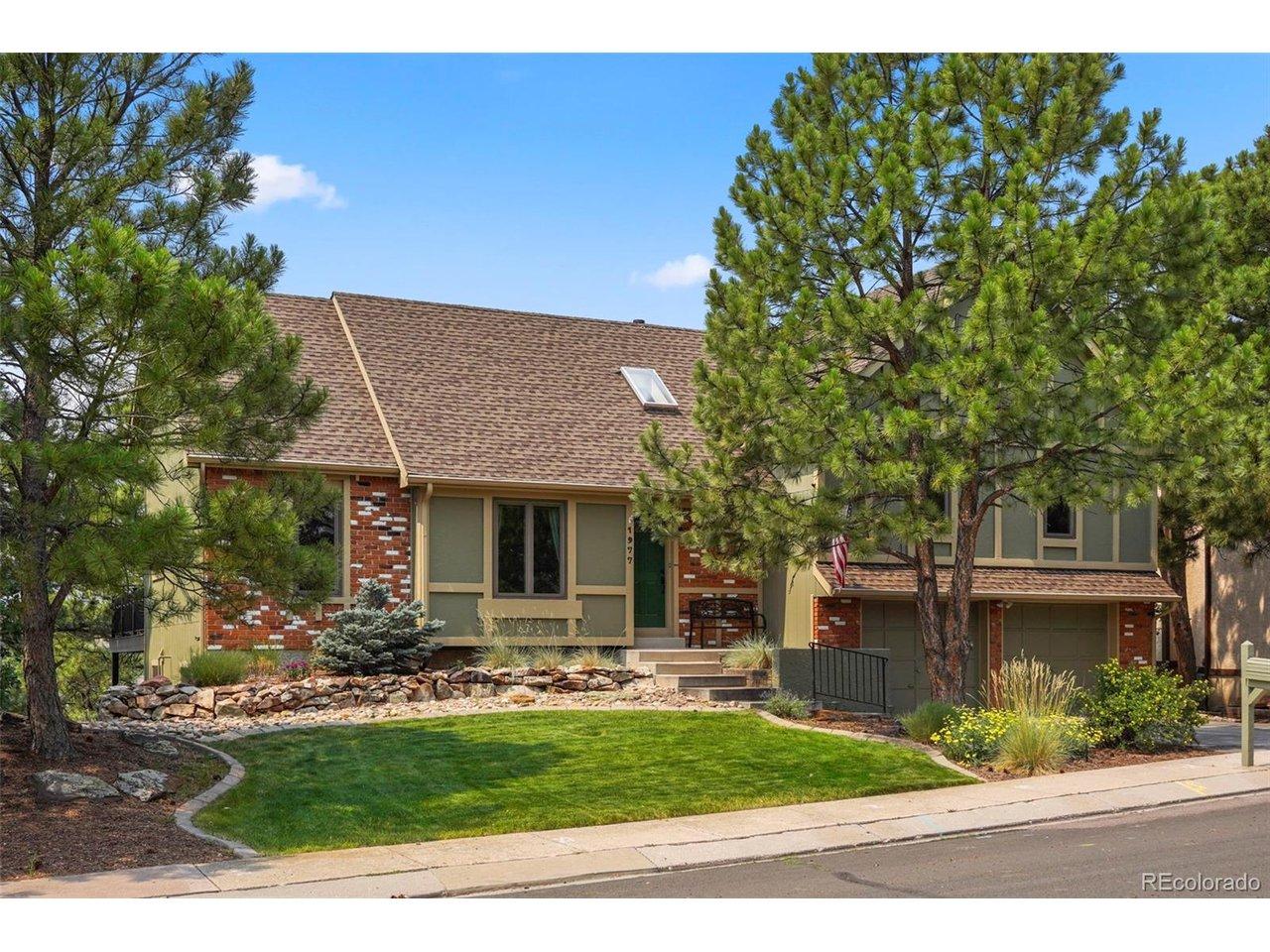 Image 3: Welcome home to this stunning 4-bedroom, 4-bathroom retreat with an oversized 2-car garage with built in workbench and shelving...