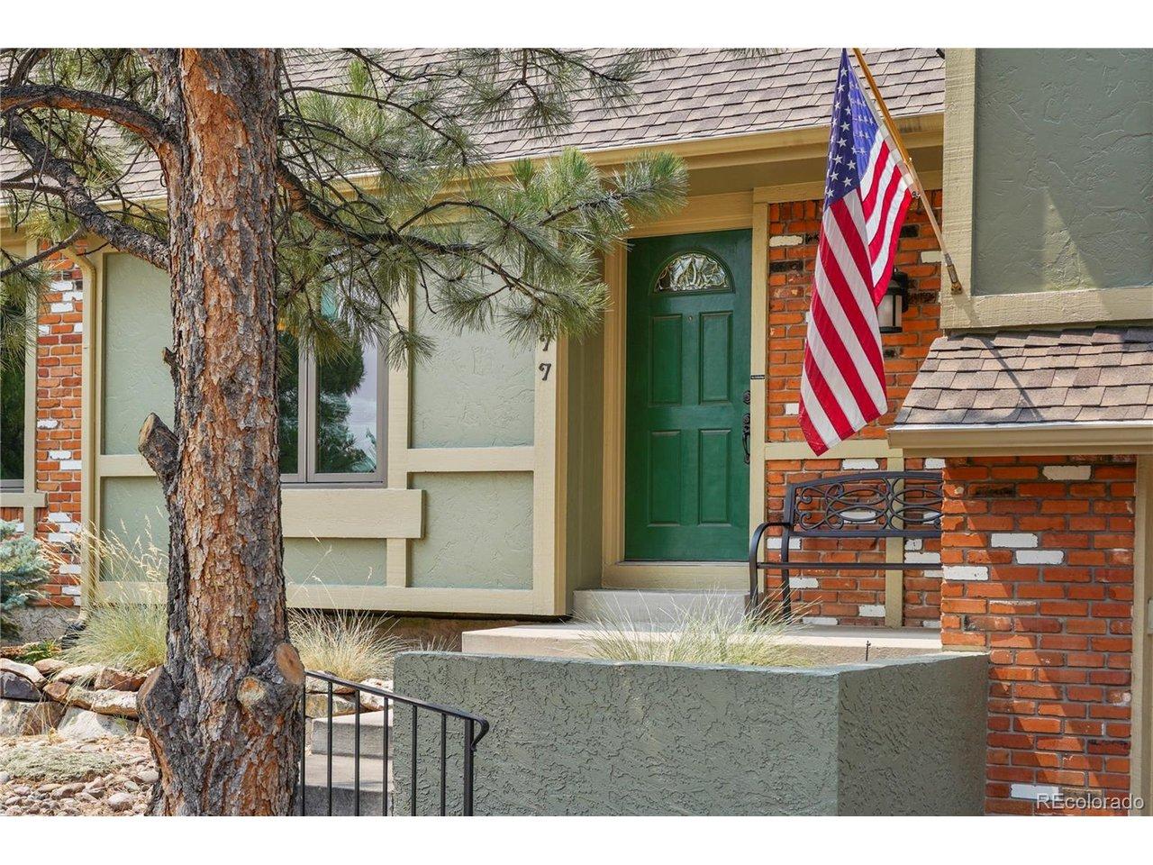 Image 4: mature landscaping and semi-covered front entry.