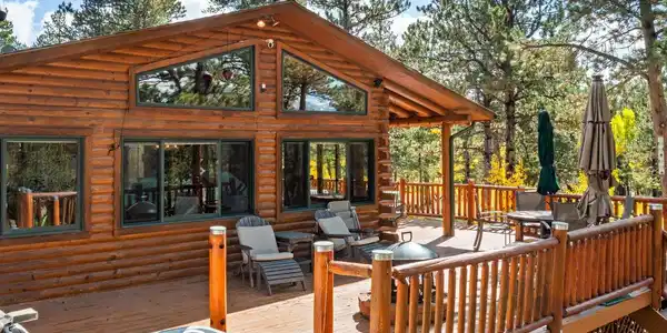 Image 2: The house facing West, offering 0ptimal outdoor living space. What better place to curl up and read a book, soak in the hot tub or cuddle with your significant other? Image 2: The house facing West, offering 0ptimal outdoor living space. What better place to curl up and read a book, soak in the hot tub or cuddle with your significant other?
