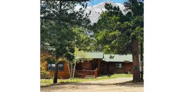 Image 3: Coyote Hill retreat showing Mount Meeker as the backdrop. Image 3: Coyote Hill retreat showing Mount Meeker as the backdrop.