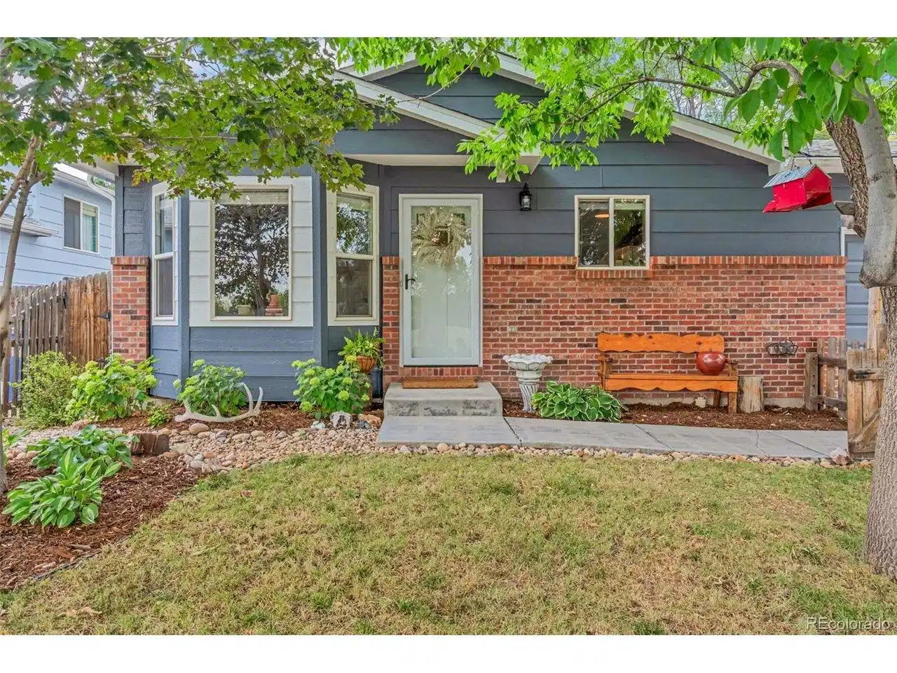 Image 1: Imagine morning coffee on the front porch beneath its shade, evenings relaxing outside, and coming home to a beautifully updated ranch where all the hard work has already been done. Image 1: Imagine morning coffee on the front porch beneath its shade, evenings relaxing outside, and coming home to a beautifully updated ranch where all the hard work has already been done.