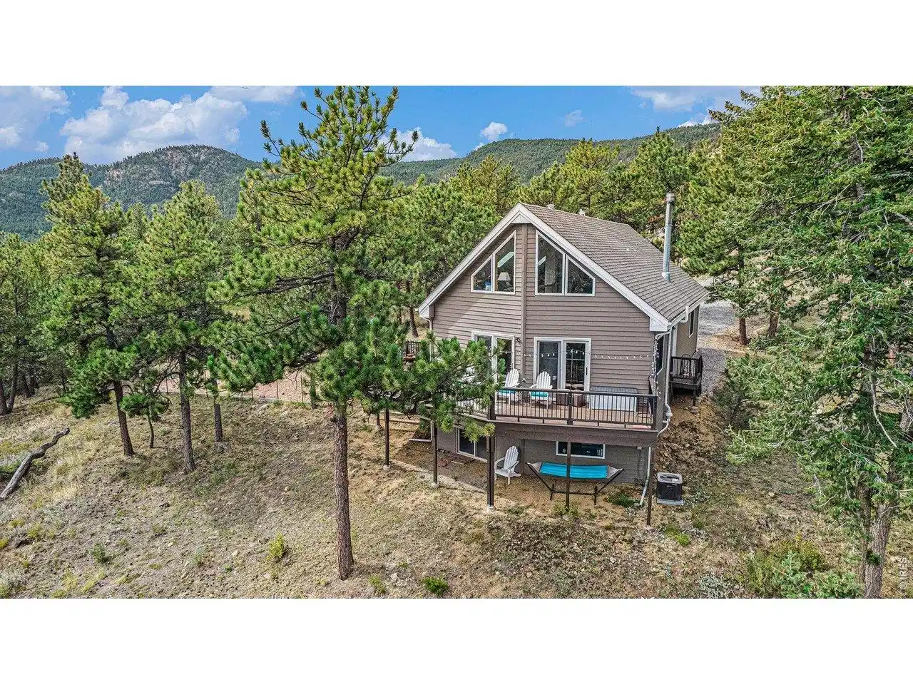 Image 1: We welcome you to come tour your own private mountain retreat among towering pines in the heart of Pinewood Springs!