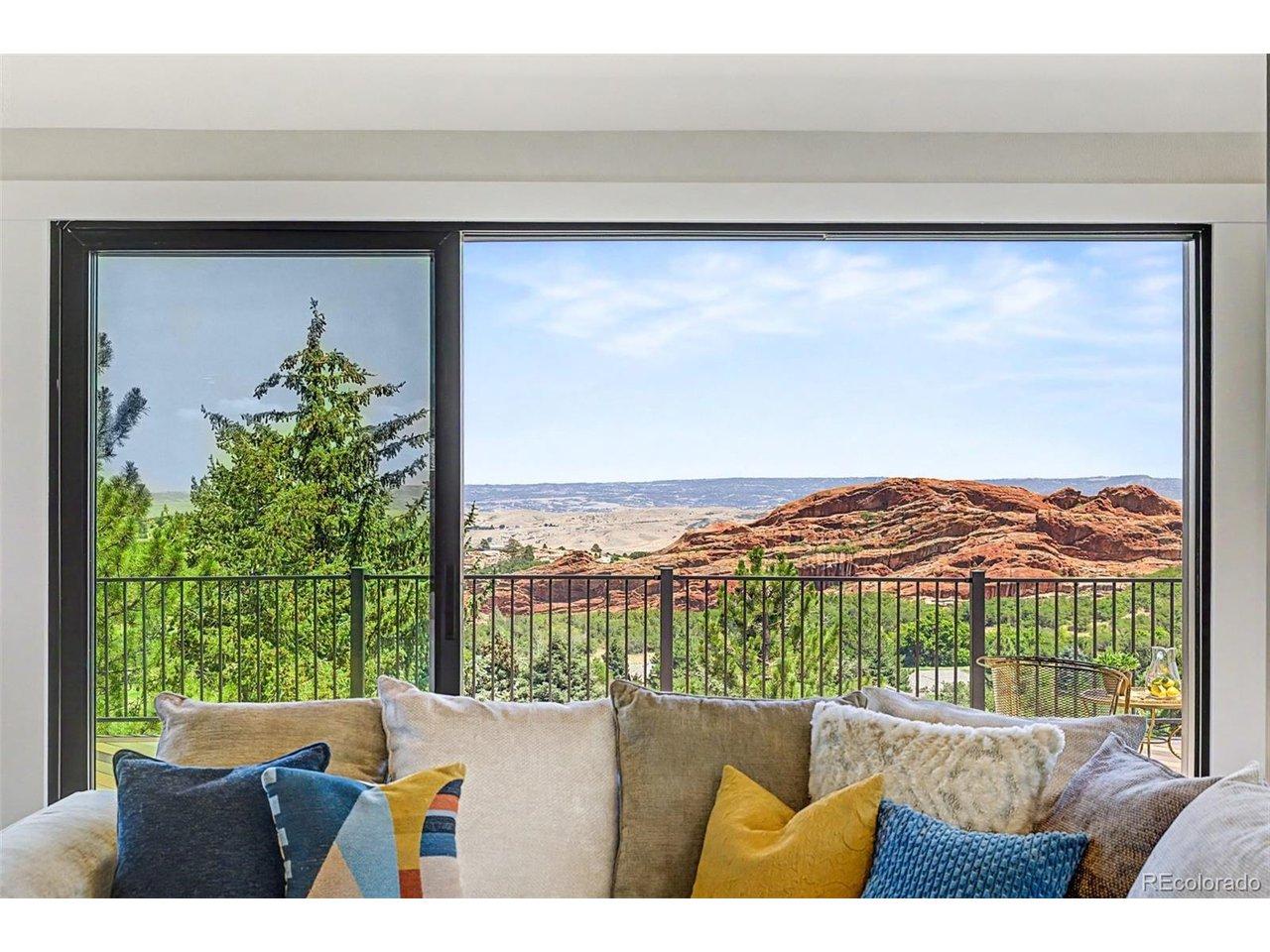Image 4: The breathtaking red rock views take center stage in the great room, creating a spectacular backdrop for everyday living. Image 4: The breathtaking red rock views take center stage in the great room, creating a spectacular backdrop for everyday living.